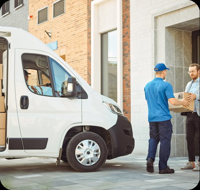 Driver handing off a package at the door